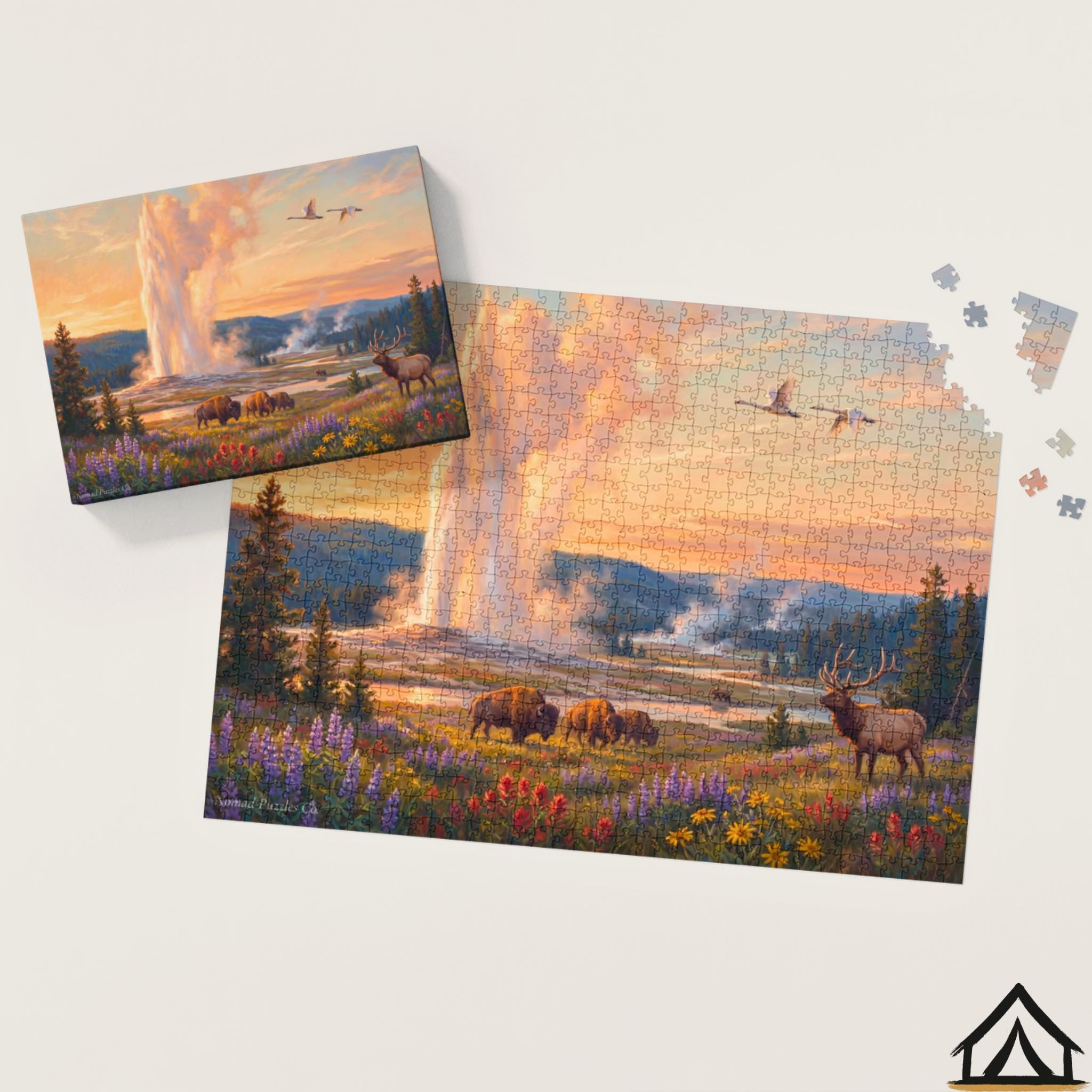 Nomad Puzzles Co. Yellowstone Old Faithful puzzle box and completed 1000 piece jigsaw puzzle